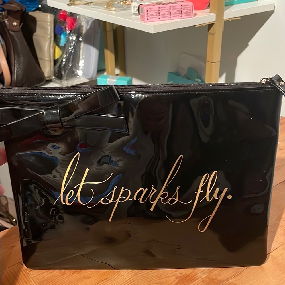 Kate Spade black patent leather clutch Cosmetic Bag with Script Design